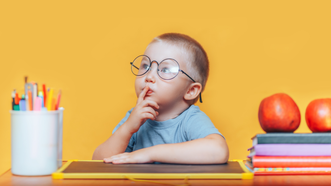 Young child deep in thought.